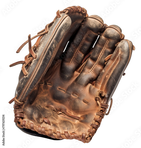 A well-worn brown leather baseball glove isolated on a black background. 