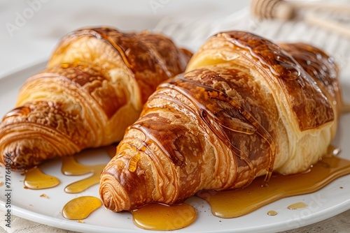 French Delicacy: Honey-Drizzled Croissants for a Sweet Morning Palette