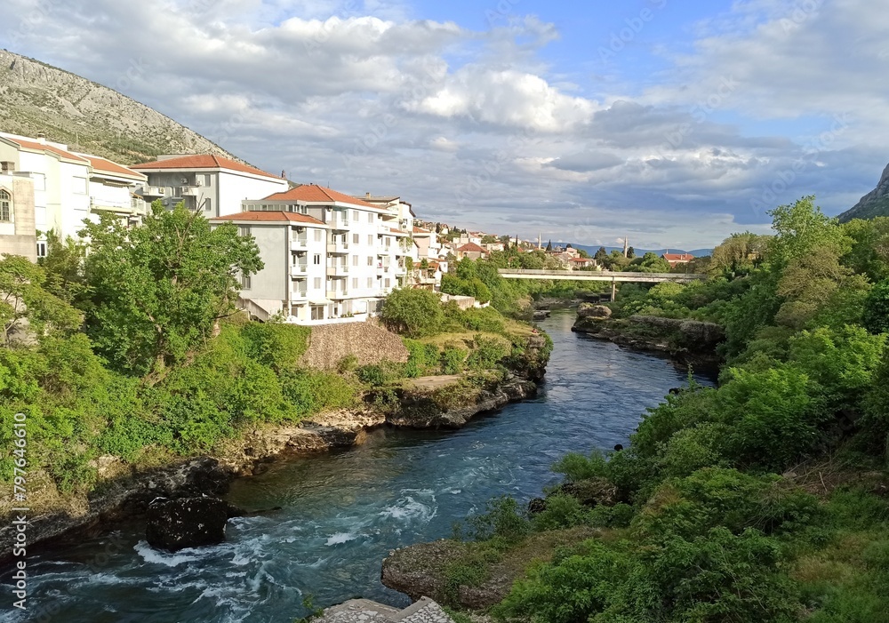 Neretva River and bridge in Mostar, Bosnia and Herzegovina at daytime in spring