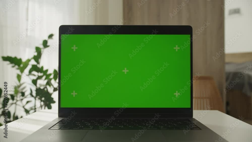 Laptop with Green Screen on Desk Dolly Zoom Laptop with Green Screen on Desk Dolly Zoom