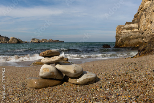 Imbricated stones on the beach and the Black Sea photo