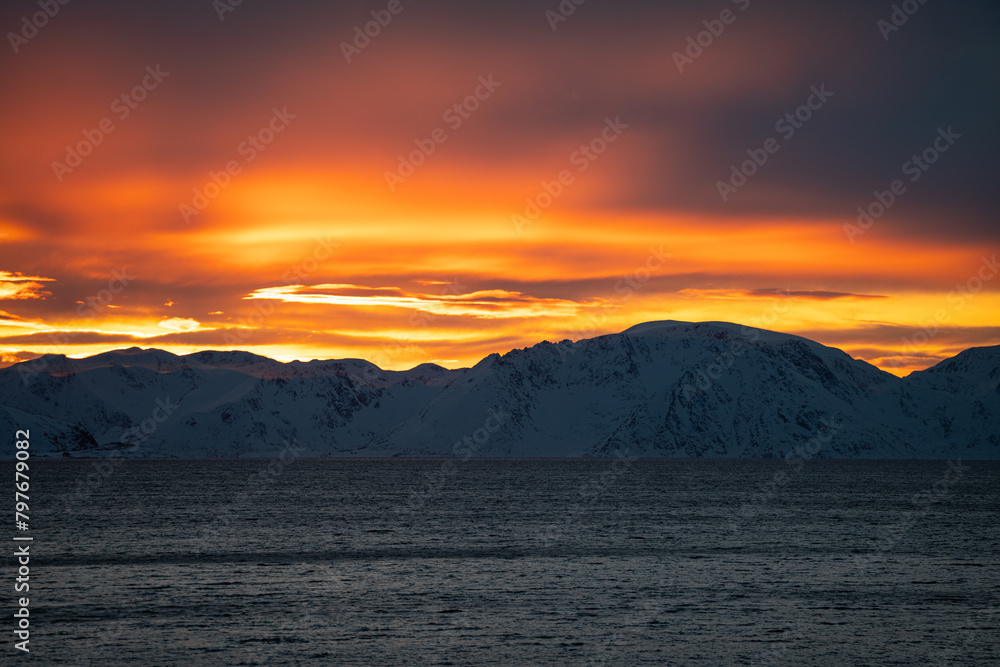 A lovely sunset over the sea and mountains