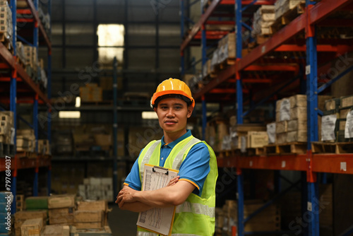 Portrait of Confident male warehouse employee