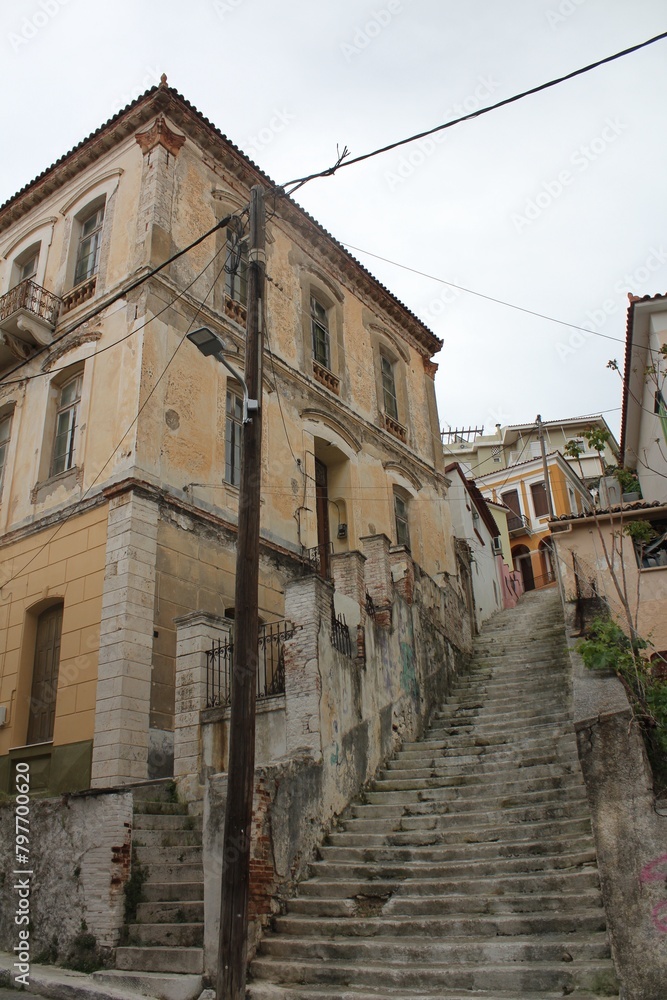 Old staircase with historical buildings Vathy. Samos, North Aegean, Greece