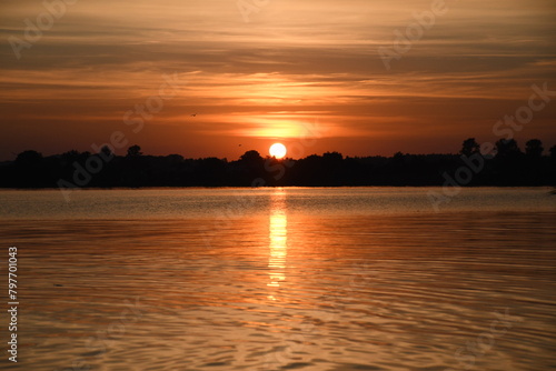 Sunset in the lake in Lithuania