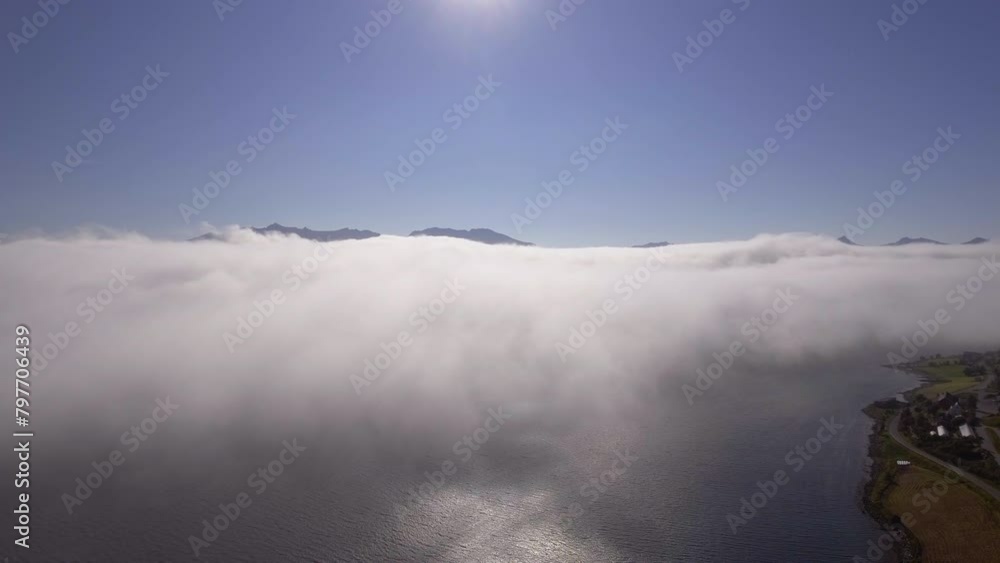 Aerial of clouds drifting over a fjord Aerial of clouds drifting over a fjord