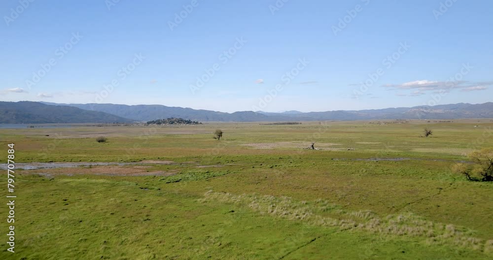 Green Field Landscape Near Lake Henshaw In San Diego, California. drone shot Green Field Landscape Near Lake Henshaw In San Diego, California. drone shot