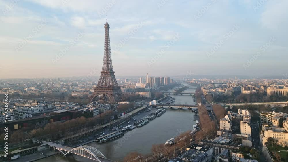 Tour Eiffel tower and Seine River, Paris in France. Aerial drone backward Tour Eiffel tower and Seine River, Paris in France. Aerial drone backward