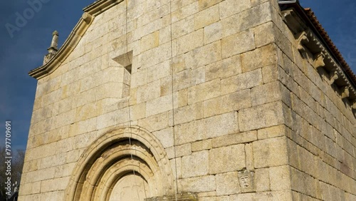 Santo André de Piñeira Seca Church Corner, Xinzo de Limia, Spain. tilt up view photo