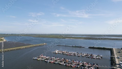 Aerial panorama of Cais do Bico, traditional boats docked in Murtosa, Aveiro