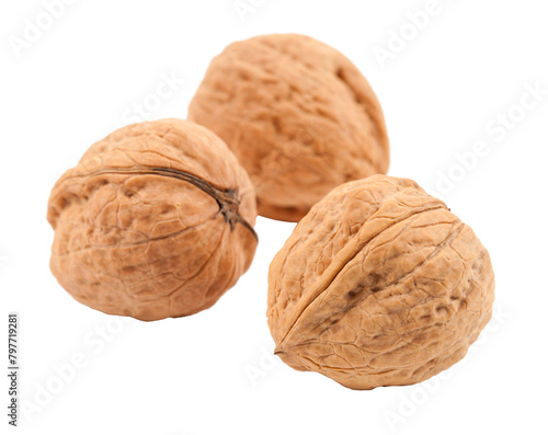 Three whole walnuts, detailed texture, white background isolated. Transparent PNG