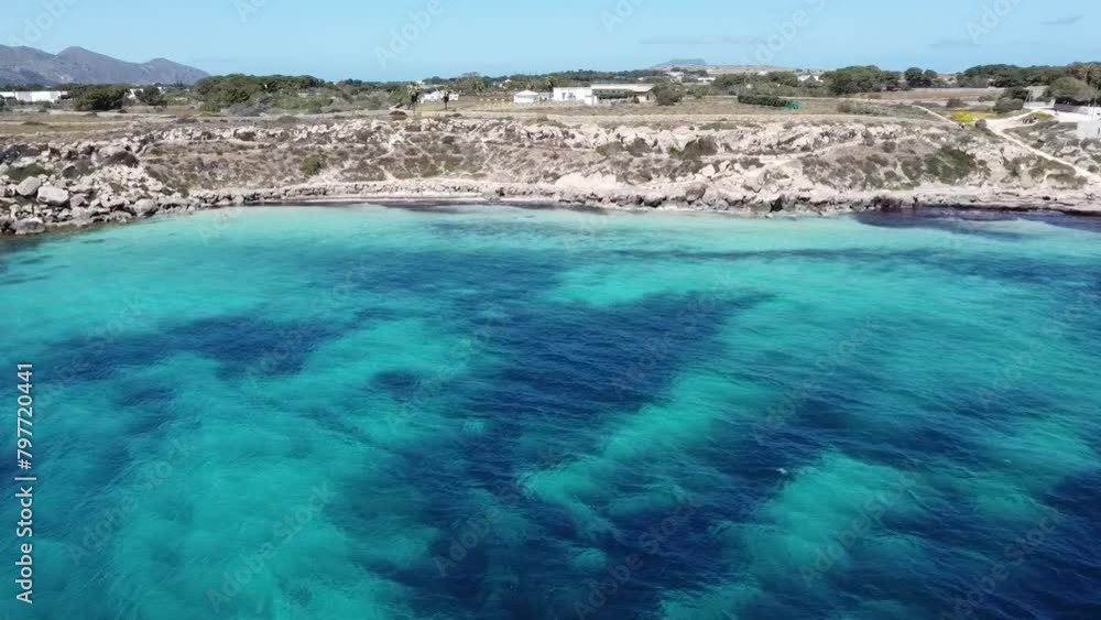 CALA AZZURRA FAVIGNANA ISLAND BLUE BEACH BY DRONE CALA AZZURRA FAVIGNANA ISLAND BLUE BEACH BY DRONE