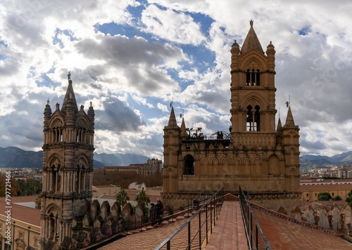 view over the rooftops of downtown Palermo with the cathedral bell towers in the foreground