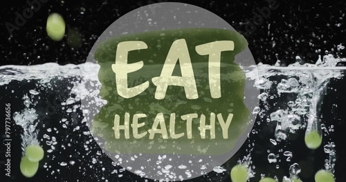 Image of eat healthy text over fruit falling in water background