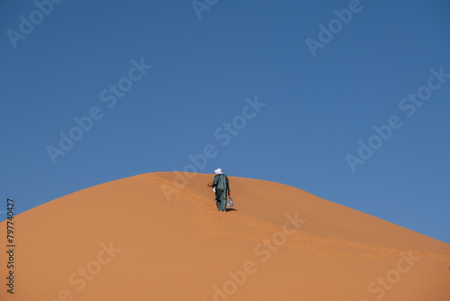 person in the desert The most beautiful safaris in the desert _ Moroccan desert _ camel riding in the desert _ meditation trips in the desert _ desert sand dunes