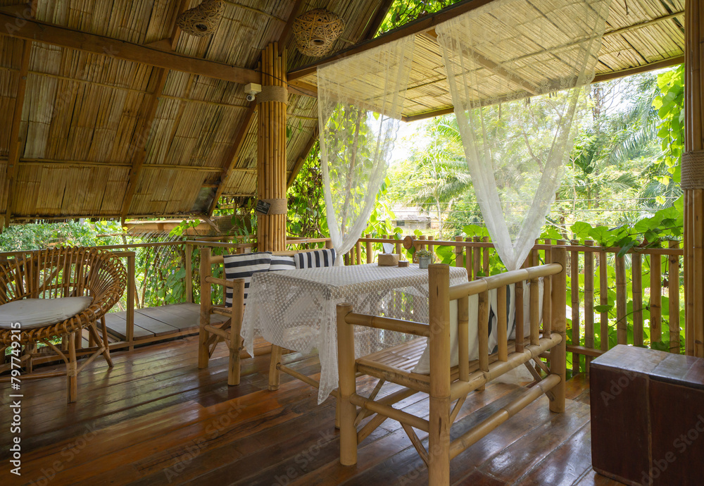Fototapeta premium Thai restaurant with nature forest trees. Interior design.