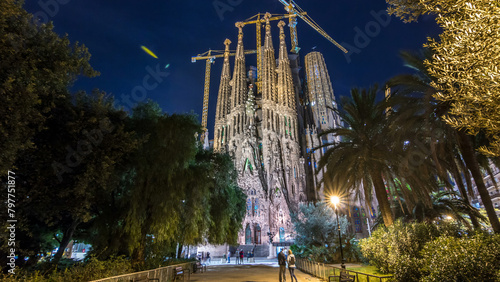 Sagrada Familia, a large church in Barcelona, Spain night timelapse hyperlapse.