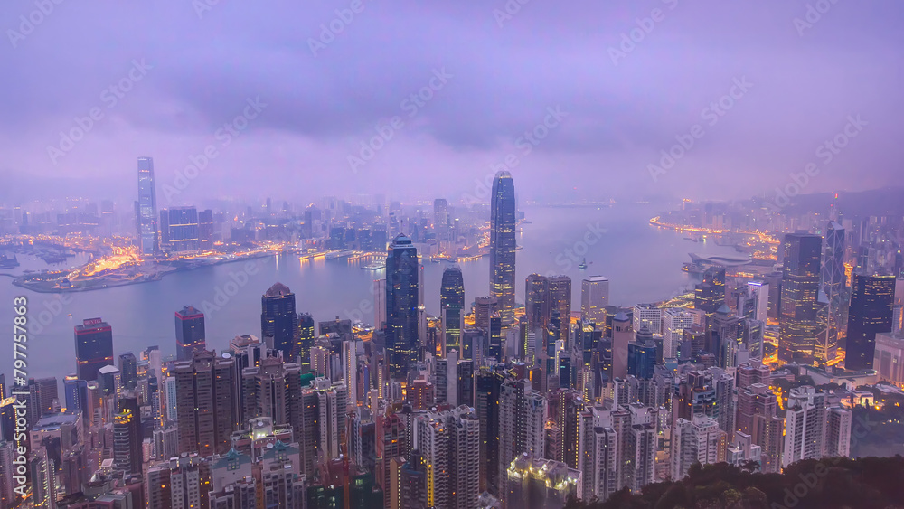 The famous view of Hong Kong from Victoria Peak night to day timelapse.
