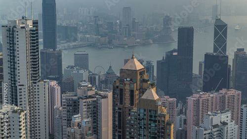 View of Hong Kong from Victoria peak in a foggy morning timelapse.