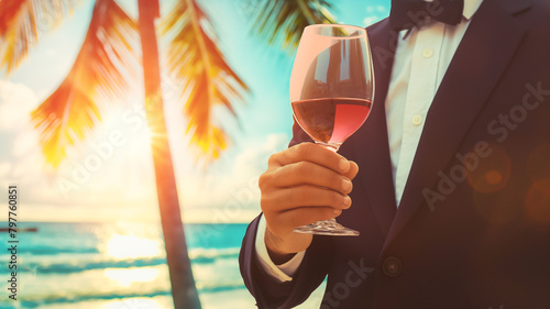 Business, vacation, summer concept. Businessman holding wine on the beach. The employee takes annual leave.  #797760851