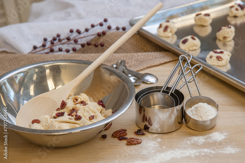 Baking scene with cookie dough and festive ingredients