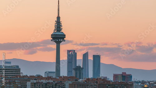 Madrid evening skyline timelapse with some emblematic buildings and towers photo