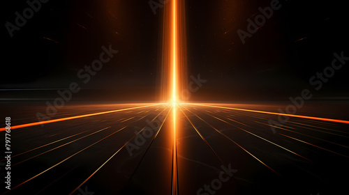 A beam of light shines on a black background, creating an orange glow effect photo