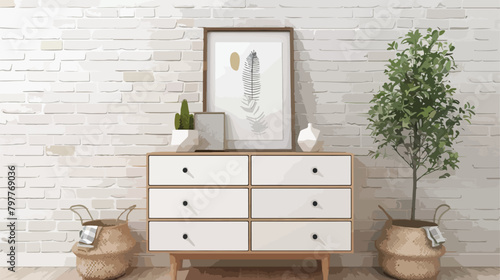 Modern chest of drawers and decor near light brick