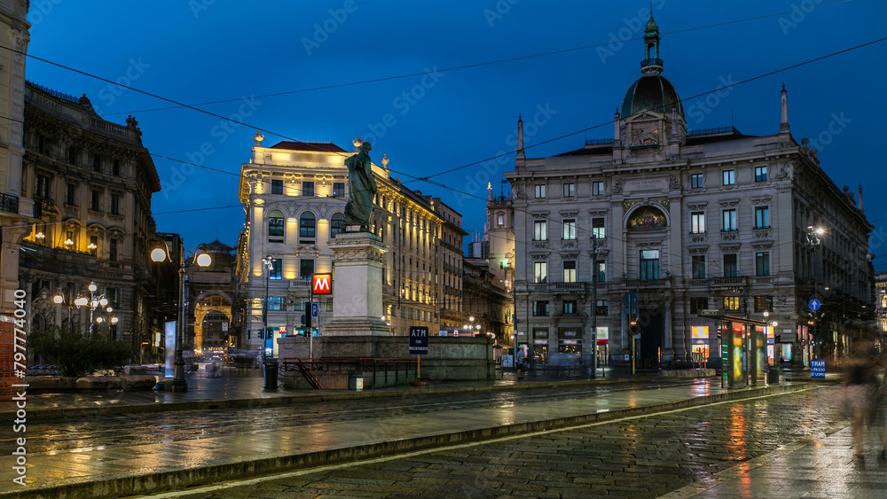 Fototapeta premium Cordusio Square and Dante street with surrounding palaces, houses and buildings day to night timelapse