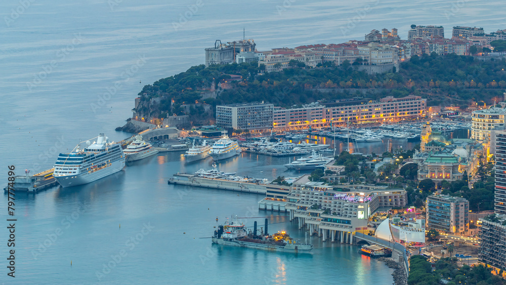 Fototapeta premium Aerial top view of Monaco from the grand corniche road day to night timelapse, Monaco France