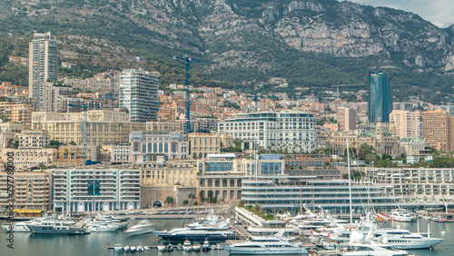 Monte Carlo city aerial panorama timelapse. View of luxury yachts and buildings in harbor of Monaco, Cote d'Azur.