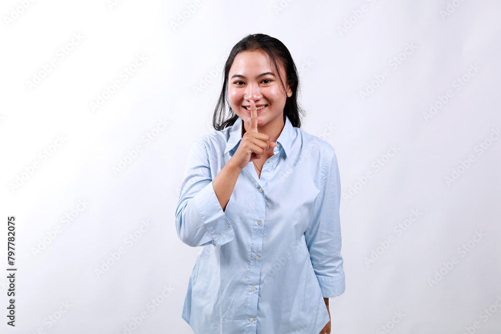Lifestyle, people emotions and office concept. Smiling cute asian girl asking keep secret, take promise not tell or be quiet about it, show shush sign, hush with finger over mouth, prepare surprise Lifestyle, people emotions and office concept. Smiling cute asian girl asking keep secret, take promise not tell or be quiet about it, show shush sign, hush with finger over mouth, prepare surprise