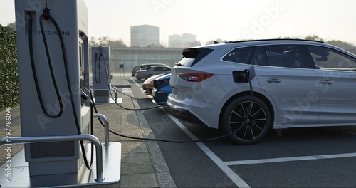 Generic electric car charging at station dock point in parking lot near shopping or office building. City street power hub providing eco-friendly sustainable supply for EV vehicle