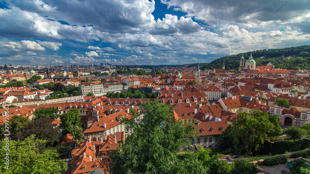 Panorama of Prague Old Town with red roofs timelapse, famous Charles bridge and Vltava river, Czech Republic.