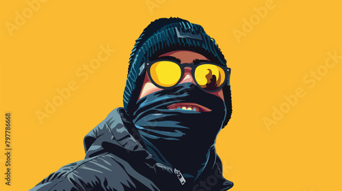 Handsome young happy man with balaclavas on yellow background photo