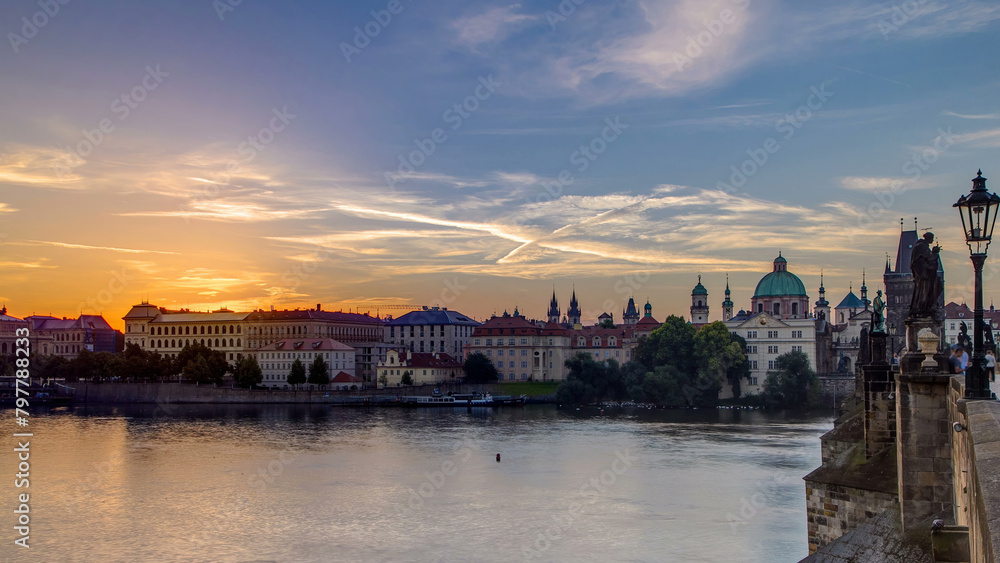 View from Charles Bridge in Prague during the sunrise timelapse, Bohemia, Czech Republic.