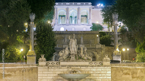 Fountain of Dea Roma timelapse in Piazza del Popolo with Pincio terrace in the background photo