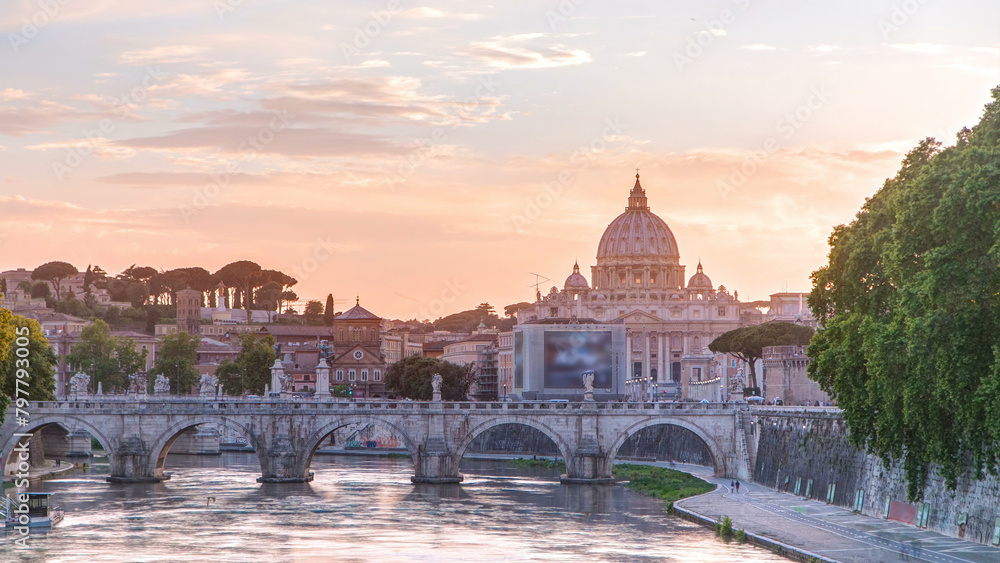 Fototapeta premium St. Peter's Basilica, Saint Angelo Bridge and Tiber River in the sunset timelapse