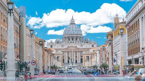 Vatican timelapse: St. Peter's Basilica in Vatican City State view from Via della Conciliazione, Road of the Conciliation. photo