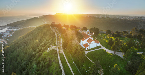 Drone aerial view on Castle of Sesimbra, national monument in Setubal district in Portugal. photo