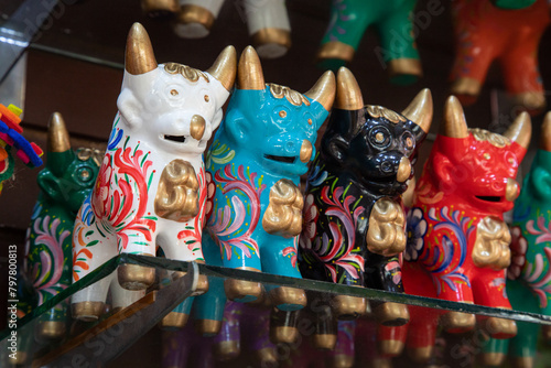 Toros de Pucara Colorful fabric or ceramic Peruvian handicrafted souvenirs photo