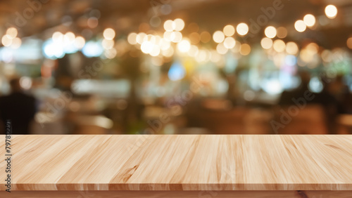 empty wooden table top and blur of room on a blur bright cafe decoration background. Generative AI