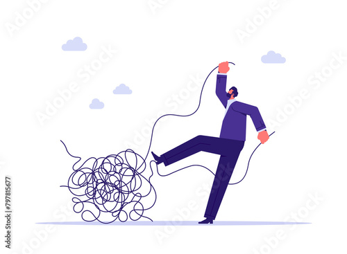 Obraz na płótnie Metaphor of business problem solving, chaos and mess difficult situation, businessman solving a string entwined