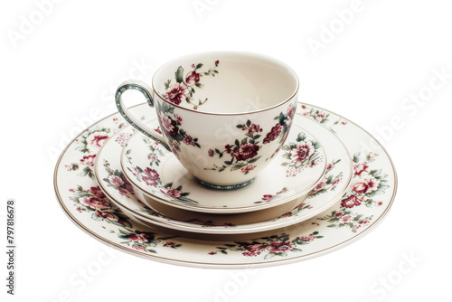 A cup delicately balances atop a saucer in a perfect alignment