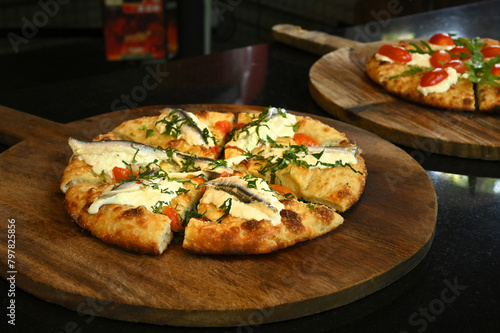 Homemade  Italian Pizza on wood .