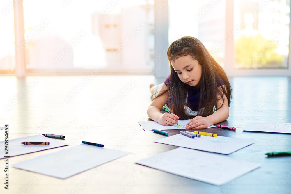 Female child, writing and drawing on floor in house with color pencil for development. Girl, playing and learning in home with crayon or paper for kindergarten, homework and homeschool education Female child, writing and drawing on floor in house with color pencil for development. Girl, playing and learning in home with crayon or paper for kindergarten, homework and homeschool education