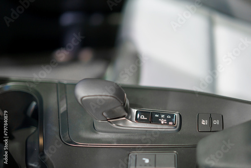 Close up of Modern car automatic gearbox and control buttons in EV car.. © ake1150