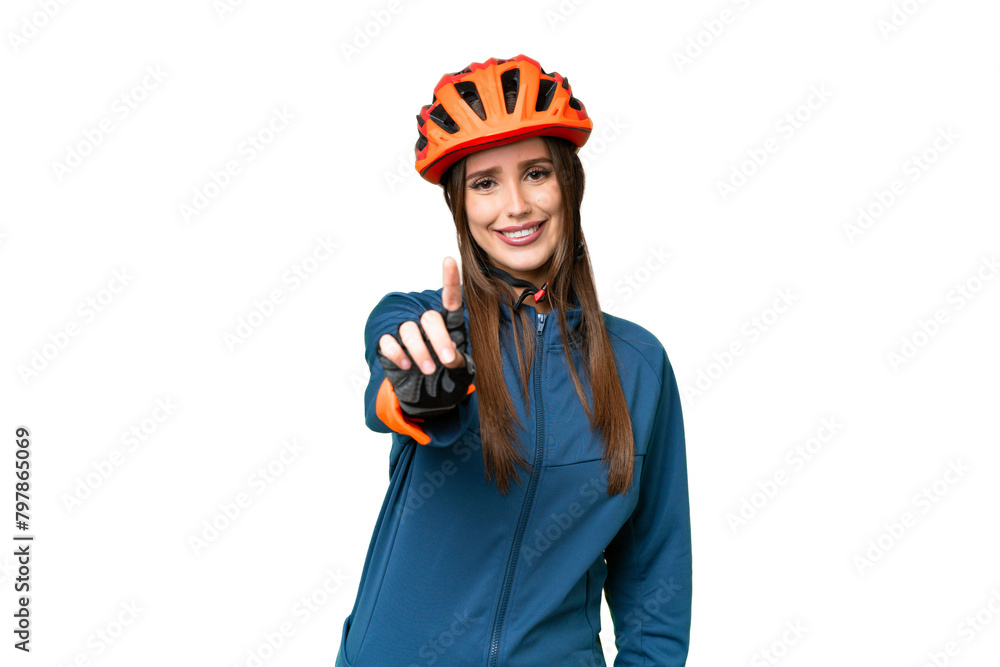 Young cyclist woman over isolated chroma key background showing and lifting a finger Young cyclist woman over isolated chroma key background showing and lifting a finger