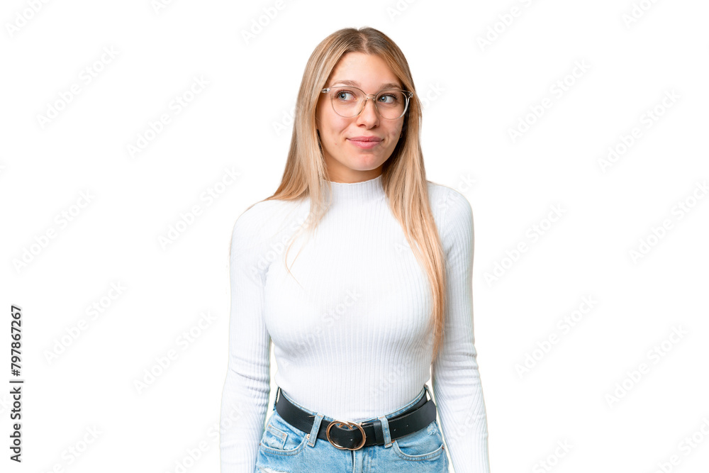 Obraz premium Young pretty blonde woman over isolated chroma key background making doubts gesture looking side