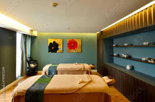 Canvas Print Interior of Spa room consisting of bench pillows towels and low level lighting